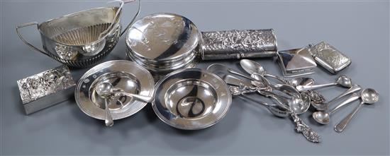 Mixed silver and plated items including a sugar bowl, small armada dishes, condiment spoons and a paperweight